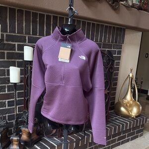 The North Face Plum Quarter-Zip Pullover. 
23 inches length.
